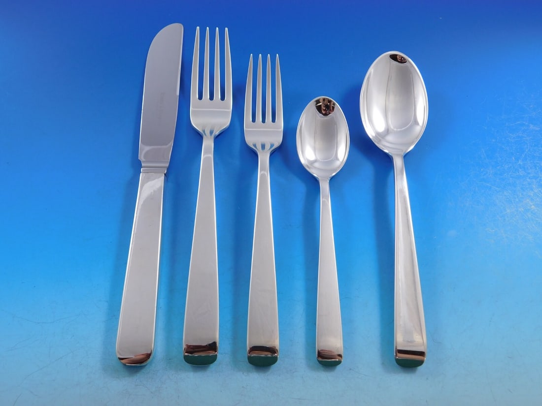 Robbe & Berking Alta 64 Piece Sterling Silver Flatware Set with Storage Chest: Robbe & Berking Alta 64 Piece Sterling Silver Flatware Set with Storage Chest Experience the elegance of the Alta flatware service set by Robbe & Berking, a hallmark of German craftsmanship. This exqu