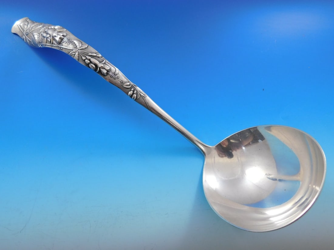Flora by Shiebler Sterling Silver 13.5 Inch Soup Ladle Vintage Floral Motif: Flora by Shiebler Sterling Silver 13.5 Inch Soup Ladle Vintage Floral Motif This exquisite Flora by Shiebler sterling silver soup ladle features a stunning floral motif, showcasing the intricate craft