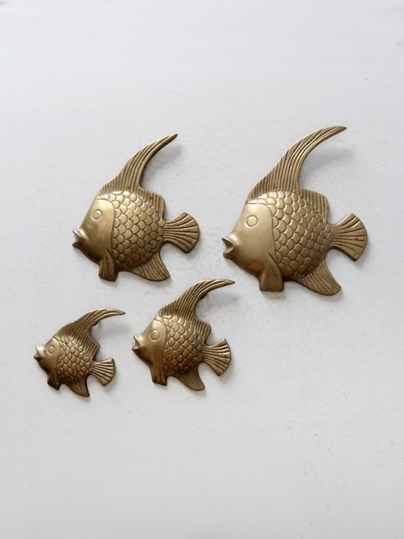 Set of 4 Mid Century Brass Angelfish Wall Art Decor: Set of 4 Mid Century Brass Angelfish Wall Art Decor Enhance your decor with this exquisite set of four mid-century brass fish wall art pieces. Each cast brass Angelfish showcases intricate textural de