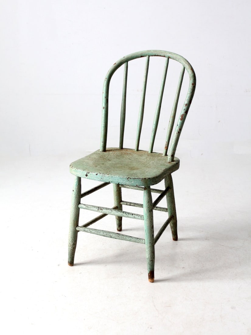 Antique Koenig Furniture Seafoam Green Spindle Back Chair: Antique Koenig Furniture Seafoam Green Spindle Back Chair This early 20th-century American bow back Windsor-style chair showcases a classic spindle design with a beautifully aged seafoam green finish.