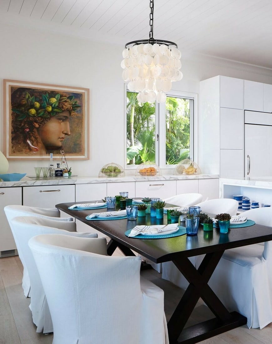 Selene Faux Shell Shade Black Pendant Chandelier for Dining or Kitchen Island: Selene Faux Shell Shade Black Pendant Chandelier for Dining or Kitchen Island This modern pendant chandelier features a black iron and metal frame with an off-white faux shell round shade. Designed fo