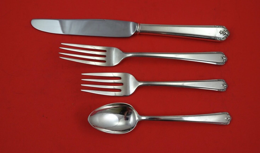 Lunt Colonial Manor Sterling Silver 4-Piece Place Setting: Lunt Colonial Manor Sterling Silver 4-Piece Place Setting Enhance your dining experience with this exquisite Colonial Manor 4-piece place setting by Lunt. Crafted from high-quality sterling silver, th