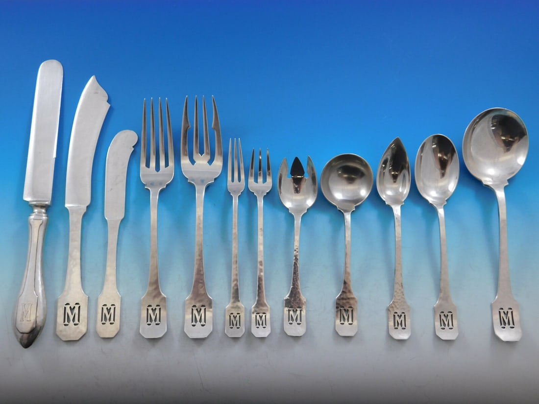 Shreve & Co Norman Hammered Sterling Silver Flatware Set 77 pcs Arts & Crafts M Monogram: Shreve & Co Norman Hammered Sterling Silver Flatware Set 77 pcs Arts & Crafts M Monogram Experience elegance with this superb Norman Hammered Sterling Silver Flatware Set by Shreve & Co., featuring 77