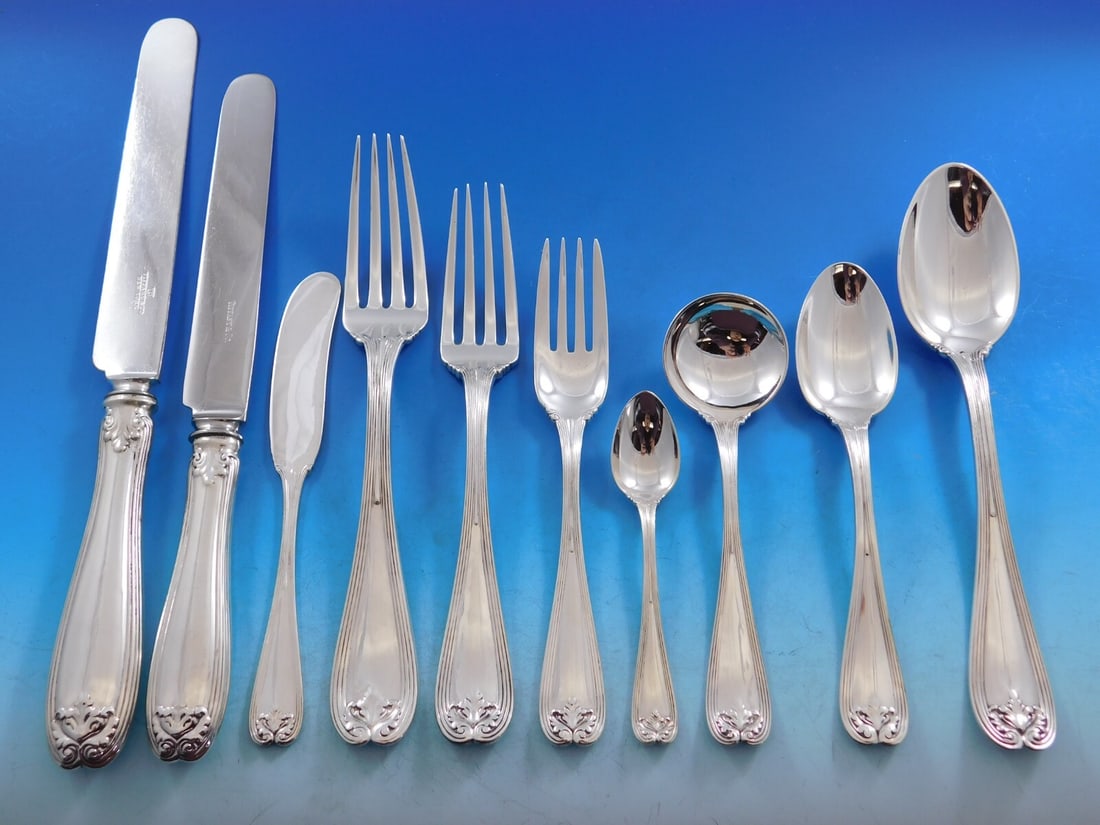 Tiffany Colonial Sterling Silver Flatware Set 179 pcs in Fitted Chest: Tiffany Colonial Sterling Silver Flatware Set 179 pcs in Fitted Chest Experience the elegance of this exceptional Colonial flatware set by Tiffany & Co., crafted from sterling silver. This vintage set