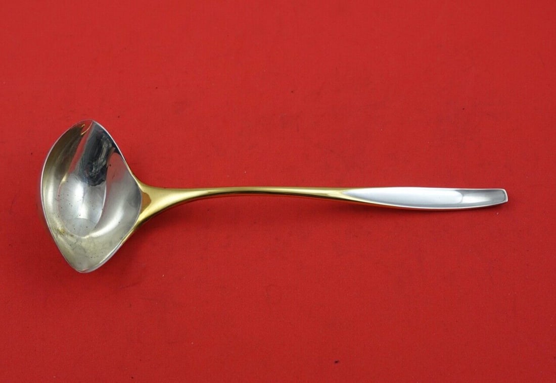 Kirk Golden Selene Sterling Silver Gravy Ladle 7 5/8 inches: Kirk Golden Selene Sterling Silver Gravy Ladle 7 5/8 inches This exquisite gravy ladle from the Golden Selene pattern by Kirk is crafted from high-quality sterling silver. Measuring 7 5/8 inches, it o