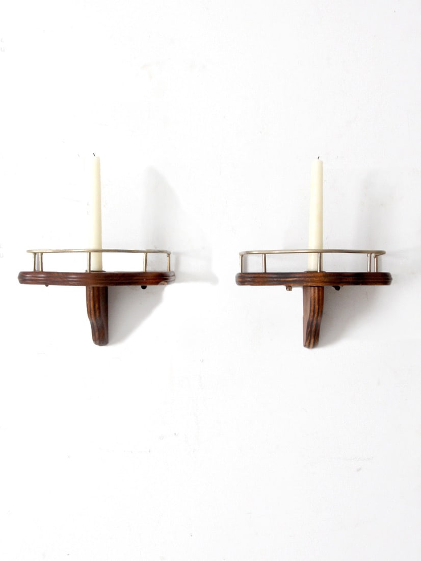 Elegant Pair of Mid-Century Wood Candle Sconces with Silver-Tone Rails: Elegant Pair of Mid-Century Wood Candle Sconces with Silver-Tone Rails Enhance your home decor with this elegant pair of mid-century wood candle sconces. Crafted from warm, dark wood, each sconce feat