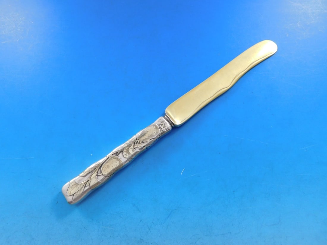 Tiffany & Co Lap Over Edge Acid Etched Sterling Silver Dessert Knife: Tiffany & Co Lap Over Edge Acid Etched Sterling Silver Dessert Knife This exquisite dessert knife is a stunning example of Tiffany & Co.'s craftsmanship, featuring the elegant Lap Over Edge pattern. M