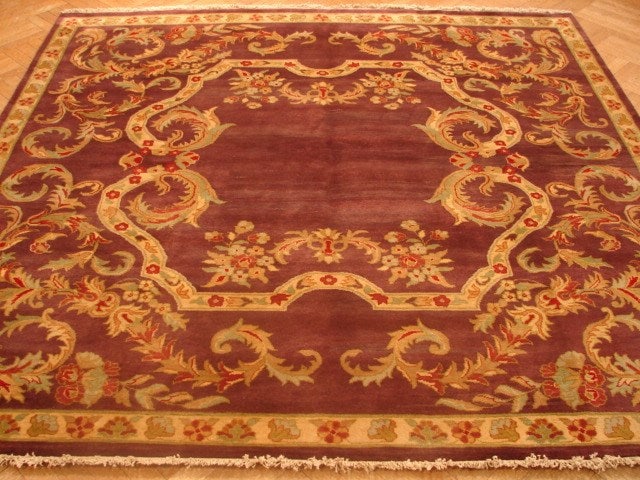 Handmade Agra Area Rug 8 x 8 Plum Color Square Design: Handmade Agra Area Rug 8 x 8 Plum Color Square Design Free continental US Shipping Enhance your home decor with this exquisite 8 x 8 Square Quality Handmade Agra Rug in a stunning plum hue. Meticulous
