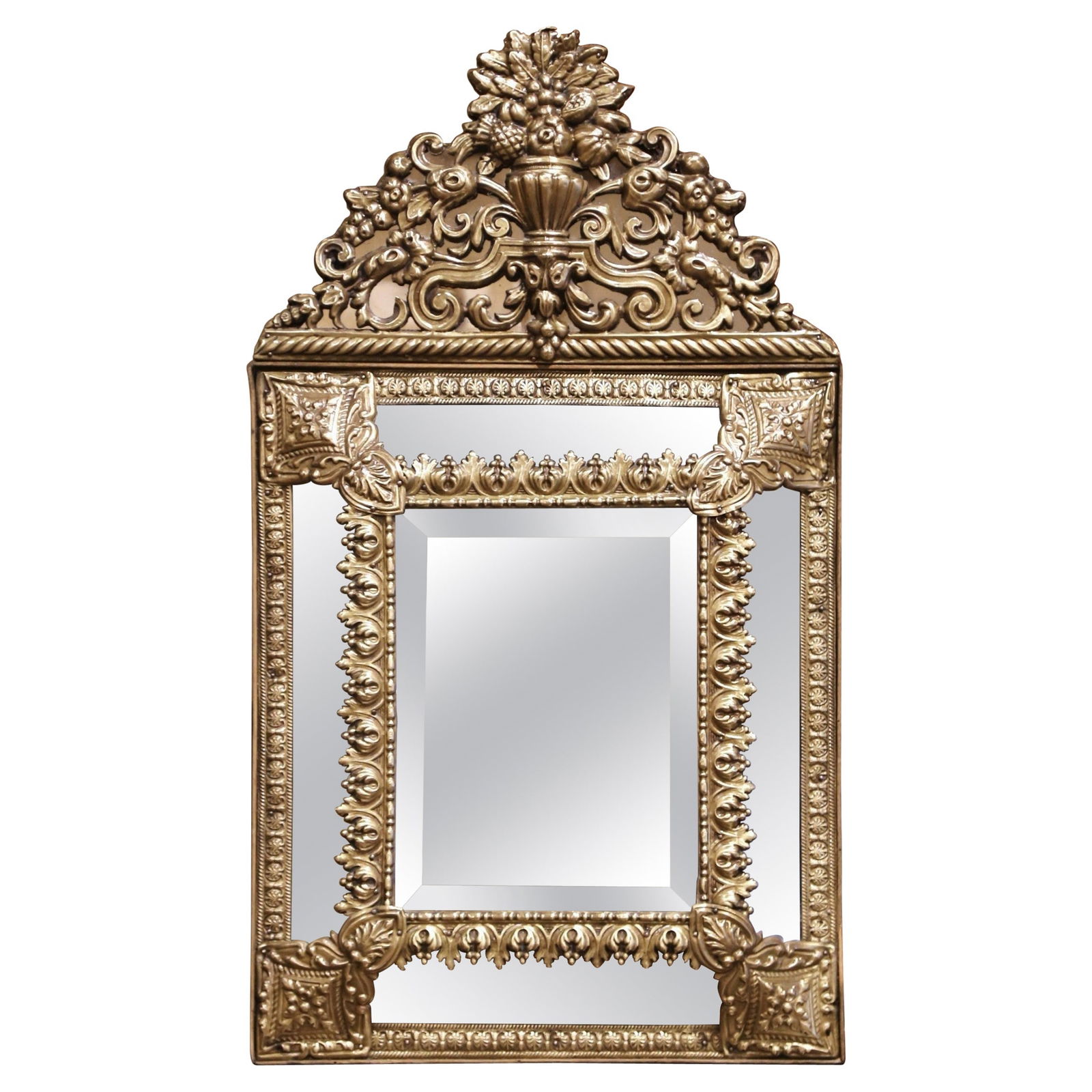 19th Century French Napoleon III Brass Beveled Wall Mirror with Repousse Design: 19th Century French Napoleon III Brass Beveled Wall Mirror with Repousse Design This exquisite 19th Century French Napoleon III wall mirror boasts an elegant cushion shape with intricate repousse scro