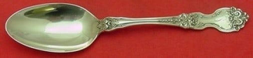 Wallace La Reine Sterling Silver Serving Spoon 8 3/8": Wallace La Reine Sterling Silver Serving Spoon 8 3/8" This exquisite serving spoon is crafted from sterling silver and features the elegant La Reine pattern by Wallace. Measuring 8 3/8" in length, thi