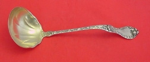 Reed & Barton Les Cinq Fleurs Sterling Silver Goldwashed Soup Ladle 11": Reed & Barton Les Cinq Fleurs Sterling Silver Goldwashed Soup Ladle 11" This exquisite soup ladle features the elegant Les Cinq Fleurs pattern by Reed & Barton, crafted from high-quality sterling silv