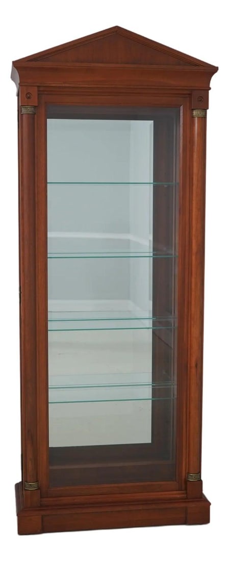 Cherry Wood Curio Display From Medallion Collection With Lighting and Mirrored Back: Cherry Wood Curio Display From Medallion Collection With Lighting and Mirrored Back This curio cabinet from the Medallion Collection features a cherry wood construction with a brown finish. It include