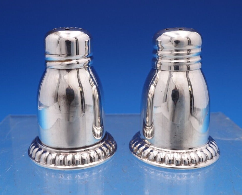 Birks Bead Sterling Silver Salt and Pepper Shaker Set 2pc: Birks Bead Sterling Silver Salt and Pepper Shaker Set 2pc Enhance your dining experience with this charming Bead by Birks Sterling Silver Salt and Pepper Shaker Set. This two-piece set features a clas