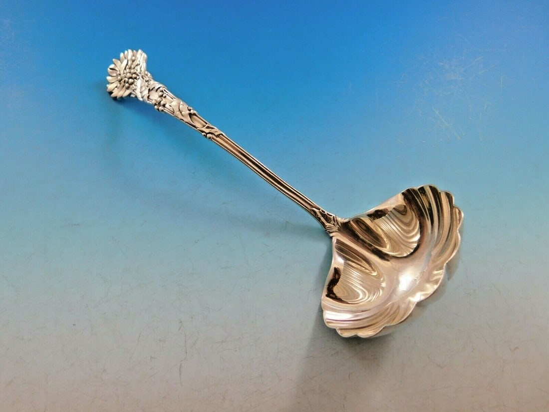 Tiffany & Co. Holly Sterling Silver Sauce Ladle 6 1/4 Shell Bowl: Tiffany & Co. Holly Sterling Silver Sauce Ladle 6 1/4 Shell Bowl Introducing the exquisite Holly Sauce Serving Ladle by Tiffany & Co., a stunning piece crafted from high-quality sterling silver. Measu