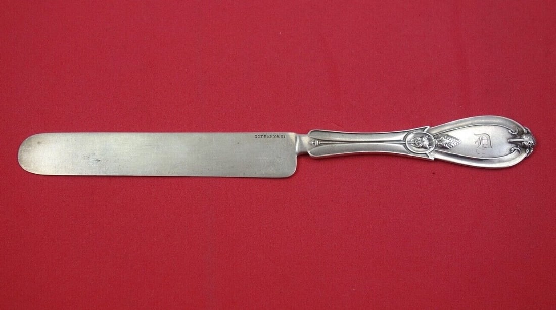 Grecian Pattern Sterling Silver Knife by Whiting-Hebbard 8": Grecian Pattern Sterling Silver Knife by Whiting-Hebbard 8" This exquisite Grecian knife by Whiting-Hebbard showcases the timeless elegance of sterling silver craftsmanship. With an 8" length, this re