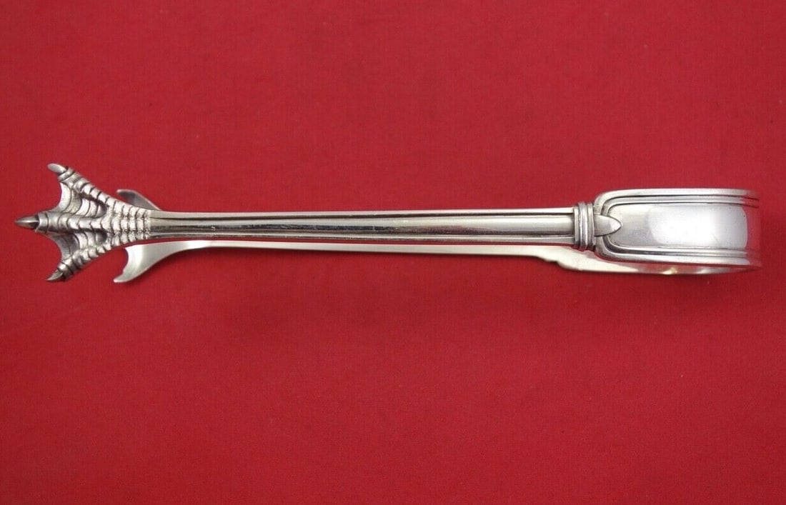 Lebkuecher & Co. 7 Inch Sterling Silver Ice Tong Serving Piece: Lebkuecher & Co. 7 Inch Sterling Silver Ice Tong Serving Piece Enhance your serving experience with this exquisite 7" Sterling Silver Ice Tong from Lebkuecher & Co. Crafted with precision, this servin