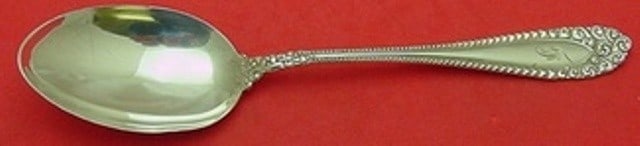 International Kenilworth Sterling Silver Serving Spoon 7 7/8" Monogrammed: International Kenilworth Sterling Silver Serving Spoon 7 7/8" Monogrammed Enhance your dining experience with the Kenilworth serving spoon, crafted from high-quality sterling silver. This elegant spoo