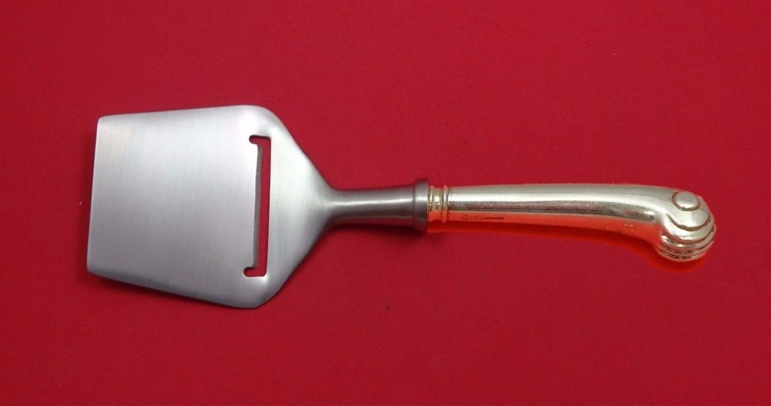 Onslow Tuttle Sterling Silver Cheese Plane Custom 8 1/4 Flat Blade: Onslow Tuttle Sterling Silver Cheese Plane Custom 8 1/4 Flat Blade Enhance your serving experience with the Onslow by Tuttle Sterling Silver Cheese Plane. Crafted from high-quality sterling silver, th
