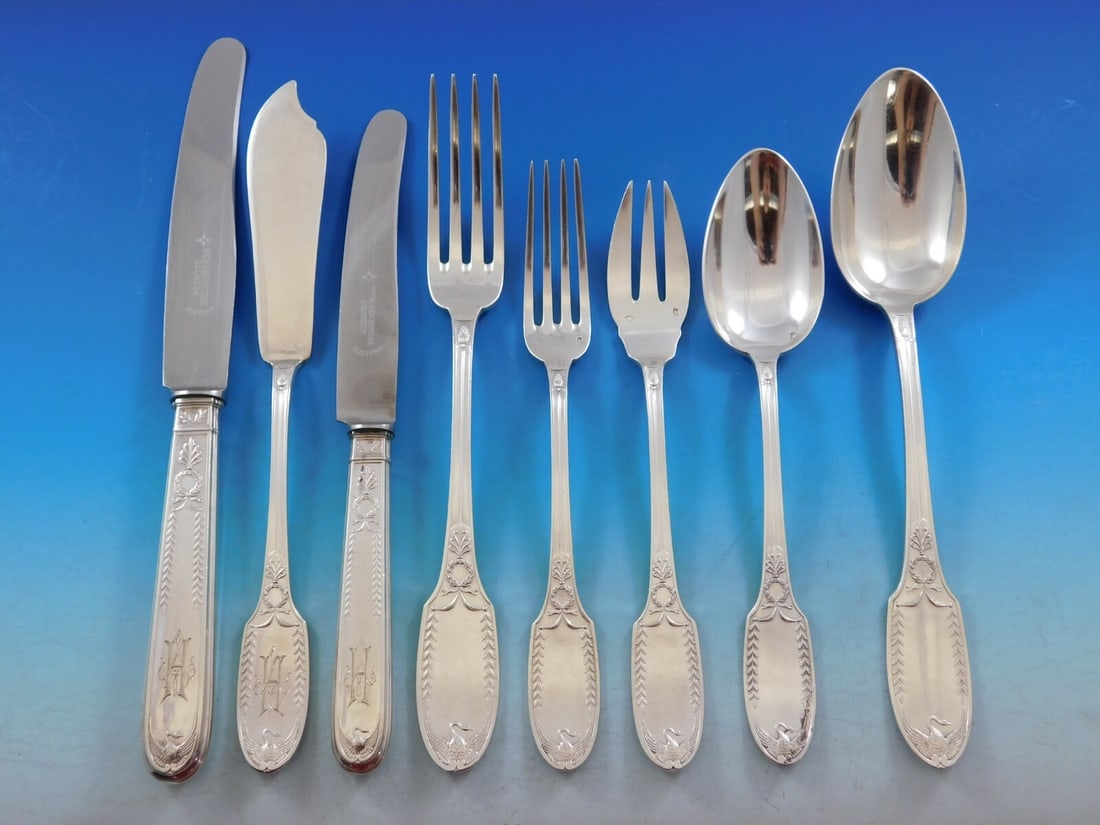 Empire by Puiforcat Sterling Silver Flatware Set 99 pcs with Swan Motif: Empire by Puiforcat Sterling Silver Flatware Set 99 pcs with Swan Motif Experience the elegance of French craftsmanship with this superb Empire by Puiforcat Sterling Silver Flatware Set, consisting of