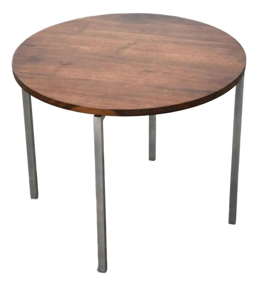 1970s Florence Knoll Round Walnut End Table with Steel Legs: 1970s Florence Knoll Round Walnut End Table with Steel Legs This exquisite mid-century modern round end table, designed by Florence Knoll, showcases a beautiful walnut finish and durable steel legs. P