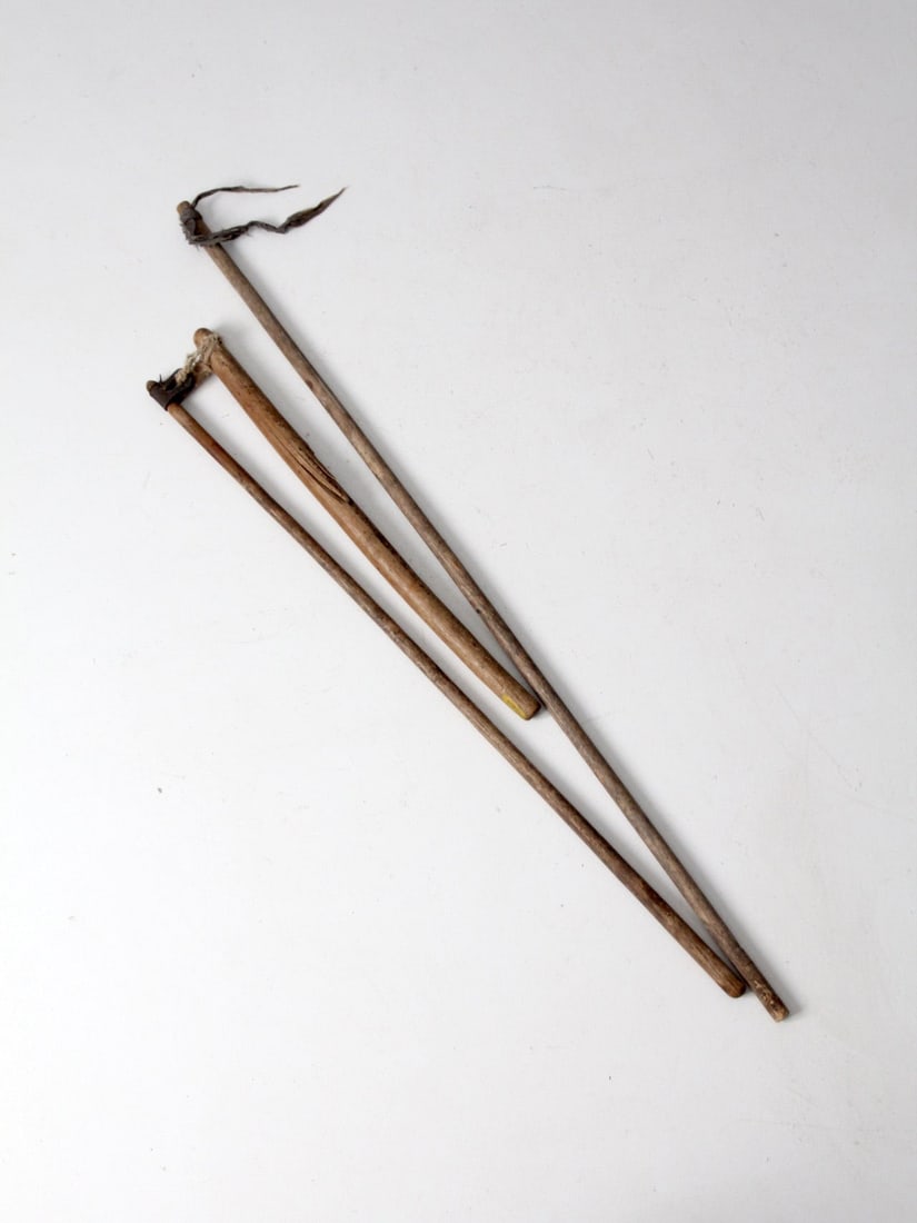 Antique Harvesting Flails Rustic Farm Tools Set: Antique Harvesting Flails Rustic Farm Tools Set Discover the charm of rustic agriculture with these antique primitive harvest tools. This set features hand-held grain threshers, known as flails, craft