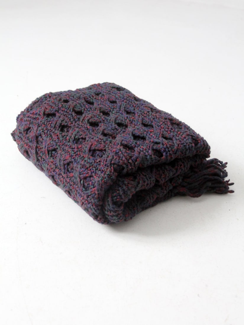 Handmade Vintage Crochet Throw Blanket in Midnight Purple: Handmade Vintage Crochet Throw Blanket in Midnight Purple This vintage crochet throw blanket showcases a beautiful handmade design featuring an open diamond pattern and stylish fringe ends. Crafted in