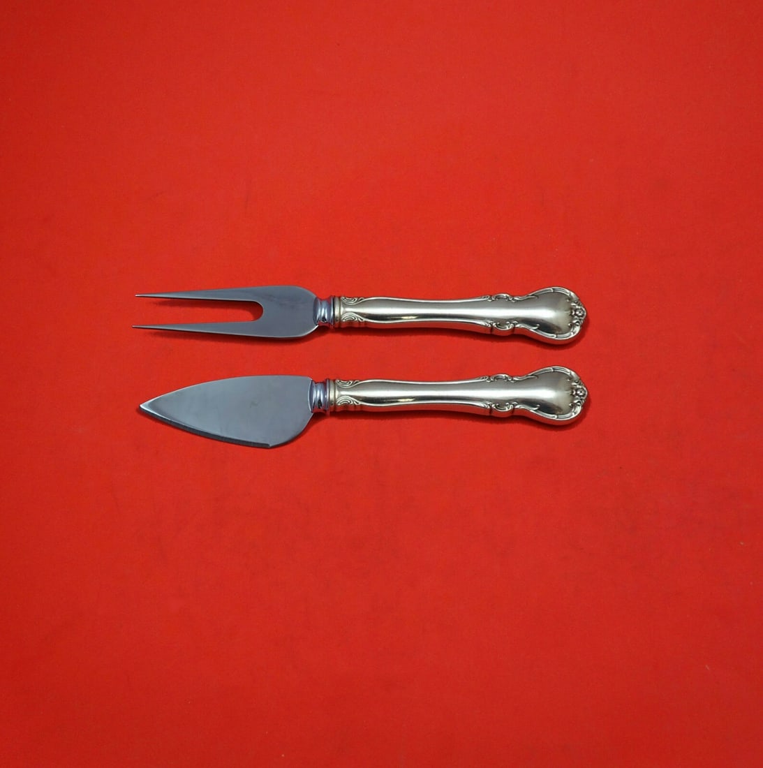 Towle French Provincial Sterling Silver Cheese Serving Set 2pc: Towle French Provincial Sterling Silver Cheese Serving Set 2pc Elevate your cheese-serving experience with this exquisite 2-piece French Provincial serving set by Towle. Crafted from sterling silver,