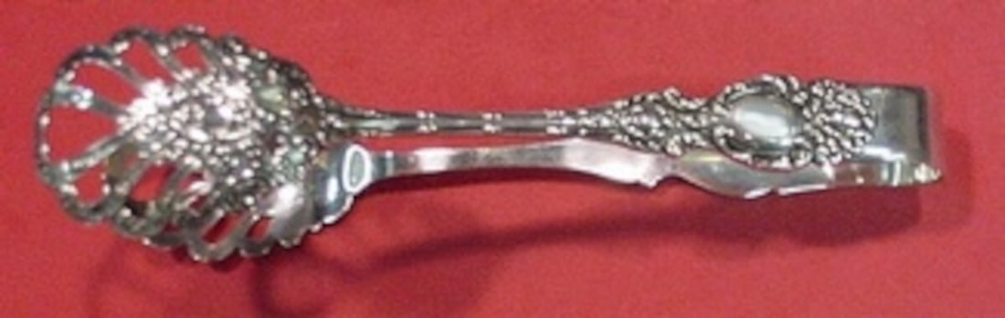 Wallace Lucerne Sterling Silver Ice Tong 7.25 Inch Serving Piece: Wallace Lucerne Sterling Silver Ice Tong 7.25 Inch Serving Piece Enhance your serving experience with this exquisite Lucerne ice tong by Wallace. Crafted from high-quality sterling silver, this servin