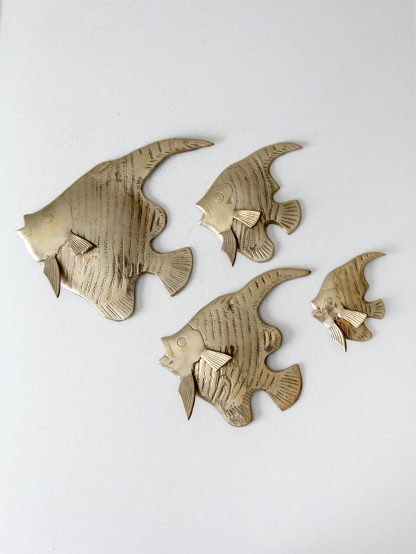 Mid Century Set of 4 Brass Angelfish Wall Art Decor: Mid Century Set of 4 Brass Angelfish Wall Art Decor Enhance your home decor with this charming set of four mid-century brass fish wall art pieces. Each cast brass angelfish showcases intricate textura