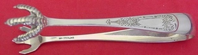 Dominick & Haff Antique Sterling Silver Sugar Tong V42 Engraved 4 3/4": Dominick & Haff Antique Sterling Silver Sugar Tong V42 Engraved 4 3/4" This exquisite sugar tong is crafted from high-quality sterling silver by the renowned maker Dominick & Haff. The piece features