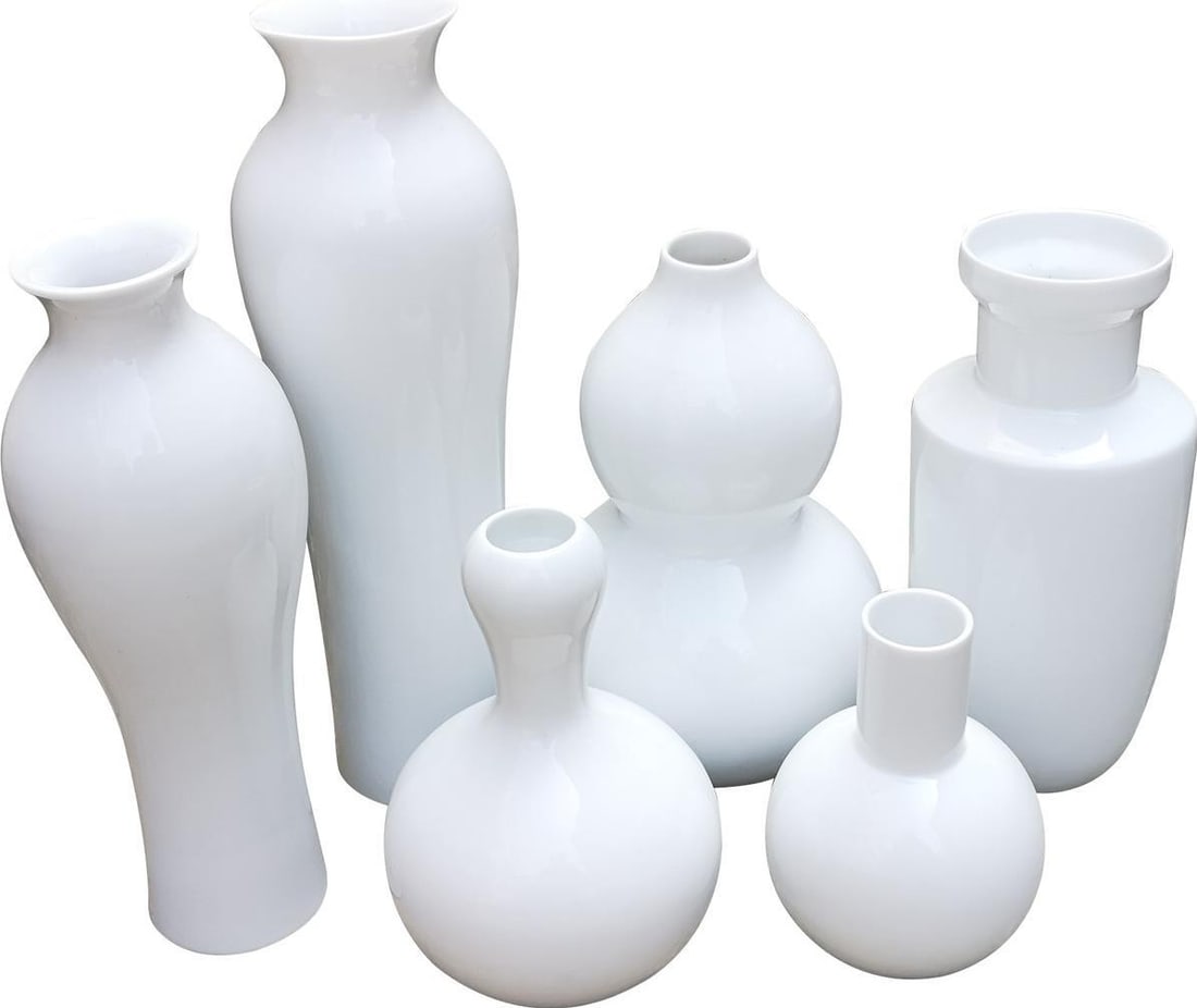 Artistic White Handcrafted Vases Set of 6 for Home Decor: Artistic White Handcrafted Vases Set of 6 for Home Decor Add a touch of elegance to your home with this artistic set of 6 handcrafted white vases. Each vase features a sleek design, perfect for displa