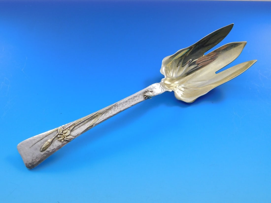 Tiffany & Co. Lap Over Edge Sterling Silver Salad Fork 9 1/8": Tiffany & Co. Lap Over Edge Sterling Silver Salad Fork 9 1/8" This exquisite salad serving fork from Tiffany & Co. features the elegant Lap Over Edge Mixed Metals pattern, crafted from high-quality st