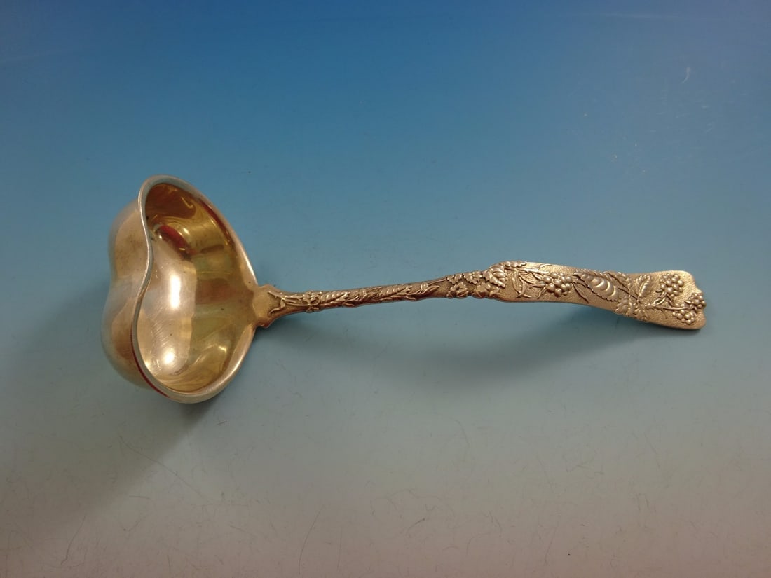Tiffany & Co. Vine Sterling Silver Gravy Ladle Heart Shaped Raspberries: Tiffany & Co. Vine Sterling Silver Gravy Ladle Heart Shaped Raspberries This exquisite gravy ladle from the Vine pattern by Tiffany & Co. showcases a beautiful raspberries motif and features a unique