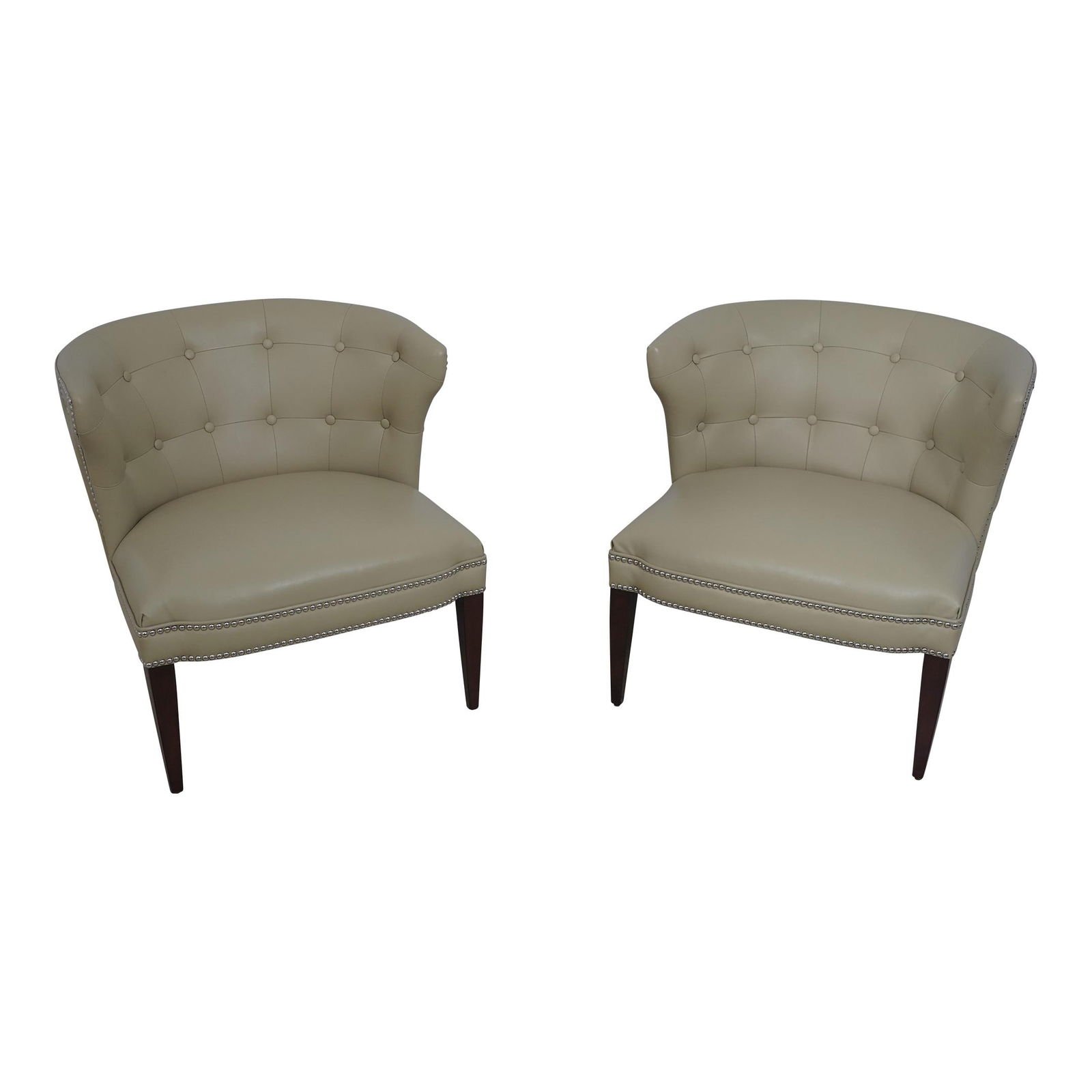 Stylish Pair of Tufted Brown Leather Occasional Chairs: Stylish Pair of Tufted Brown Leather Occasional Chairs This pair of modern design occasional chairs features a stylish tufted faux leather upholstery, making them a perfect addition to any contemporar