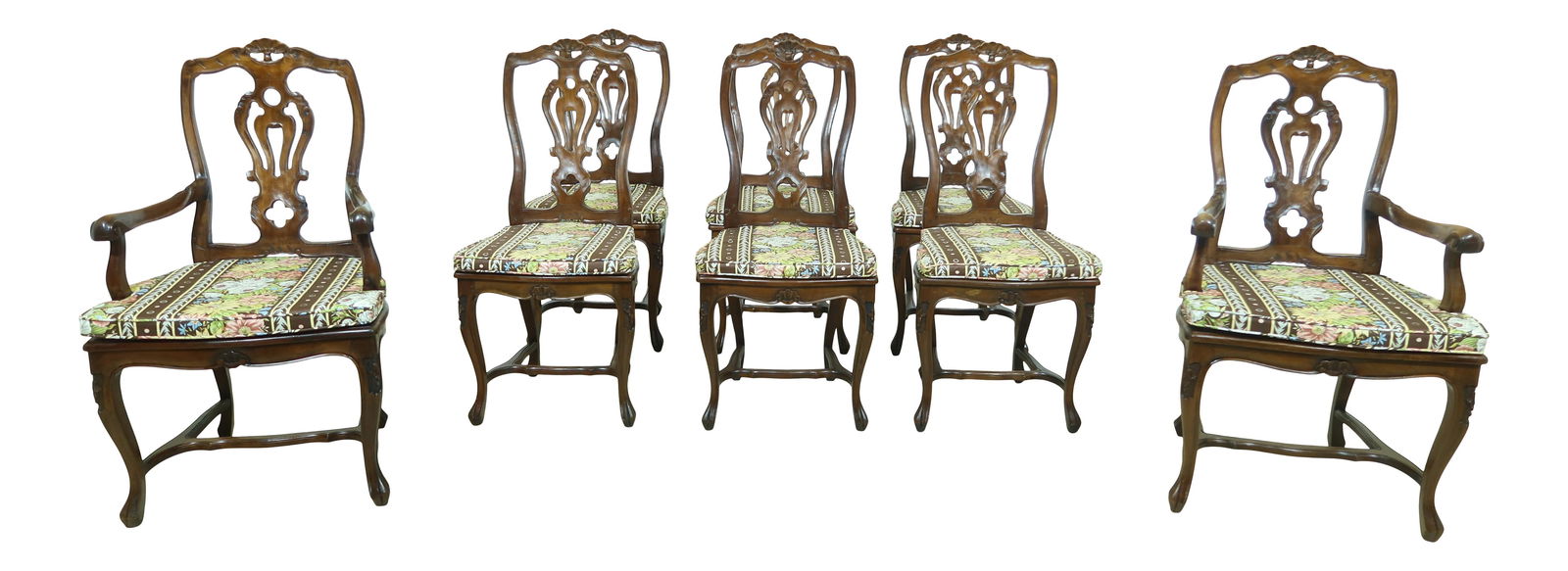 Set of 8 Vintage Italian Walnut Dining Chairs with Cane Seats: Set of 8 Vintage Italian Walnut Dining Chairs with Cane Seats This exquisite set of 8 Italian walnut dining room chairs features beautifully hand-crafted cane seats and showcases elegant carved detail
