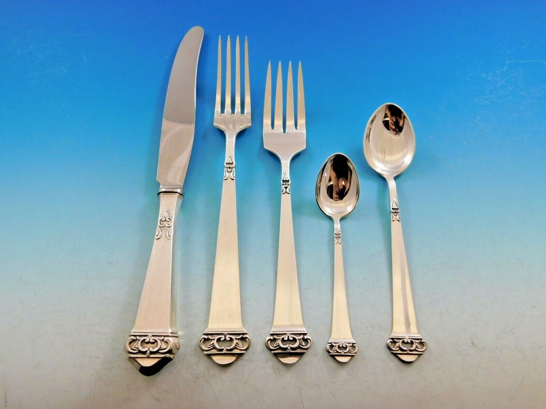 Saga Mylius Brodrene 830 Silver Flatware Set 50 pcs Norwegian with Chest: Saga Mylius Brodrene 830 Silver Flatware Set 50 pcs Norwegian with Chest Discover the elegance of the Saga by Mylius Brodrene 830 Silver Flatware Set. This exquisite 50-piece Norwegian flatware set sh