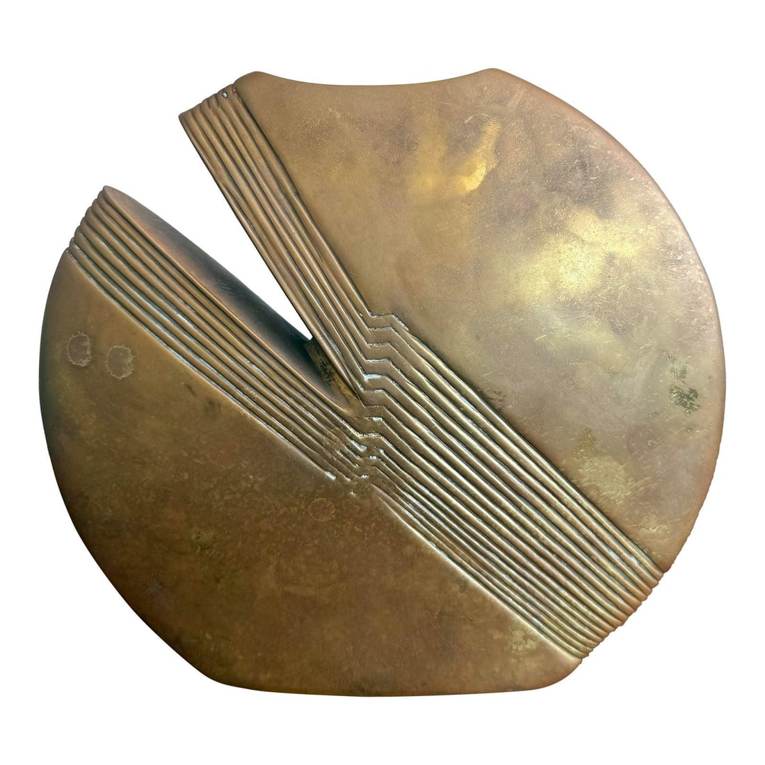 Vintage Brass Abstract Sculpture Vase with Patina: Vintage Brass Abstract Sculpture Vase with Patina This vintage Regency brass abstract vase showcases a sculptural form with a distinctive crescent shape, elegantly intersected by a series of rhythmic