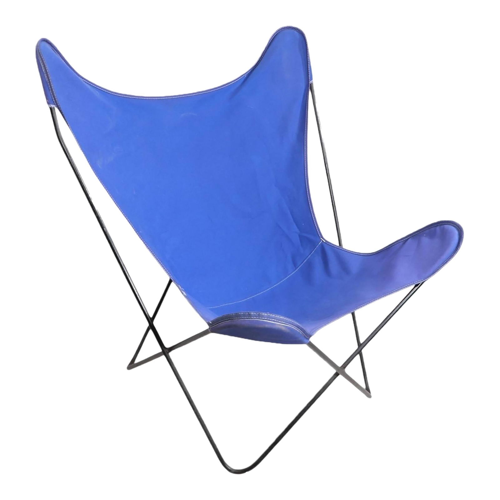 Mid Century Butterfly Sling Chair Wrought Iron Blue Canvas 1950s: Mid Century Butterfly Sling Chair Wrought Iron Blue Canvas 1950s This iconic Mid Century Butterfly Chair, inspired by the Hardoy style, features a robust wrought iron frame paired with an original blu