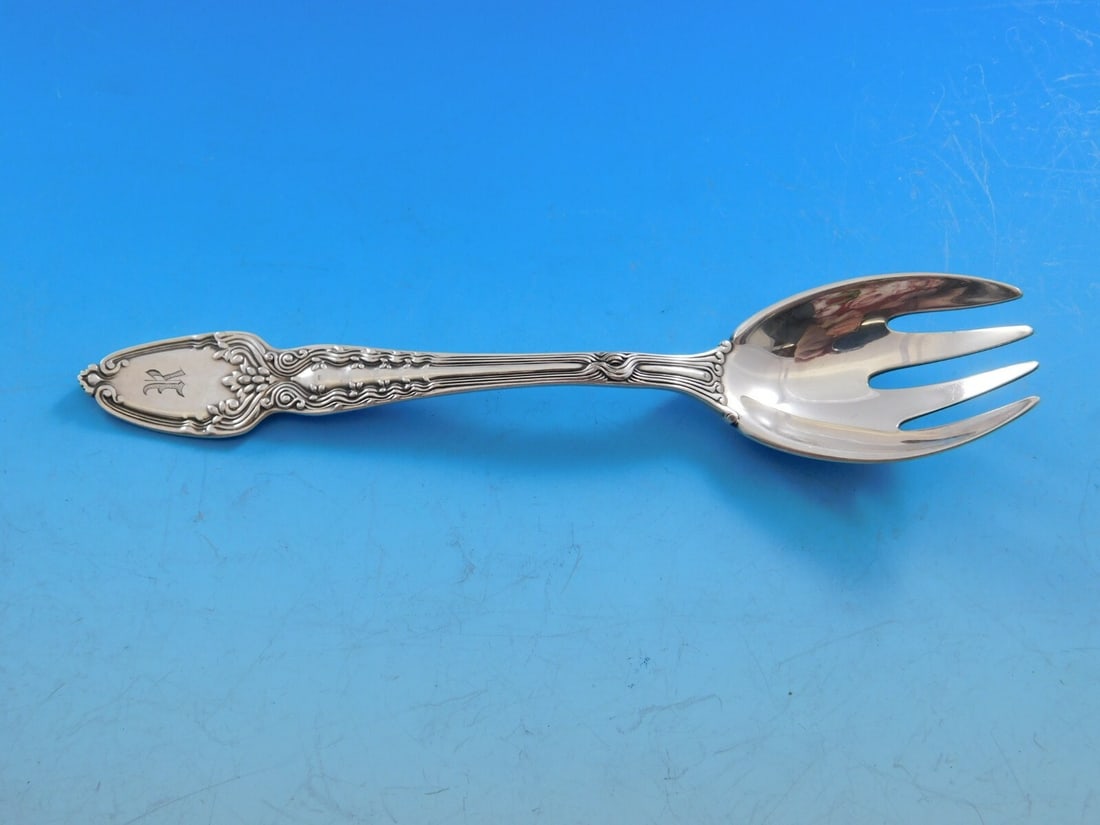 Tiffany & Co. Broom Corn Sterling Silver Ice Cream Fork 5 5/8": Tiffany & Co. Broom Corn Sterling Silver Ice Cream Fork 5 5/8" This exquisite ice cream fork from Tiffany & Co. is crafted in sterling silver and features the elegant Broom Corn pattern. Measuring 5 5