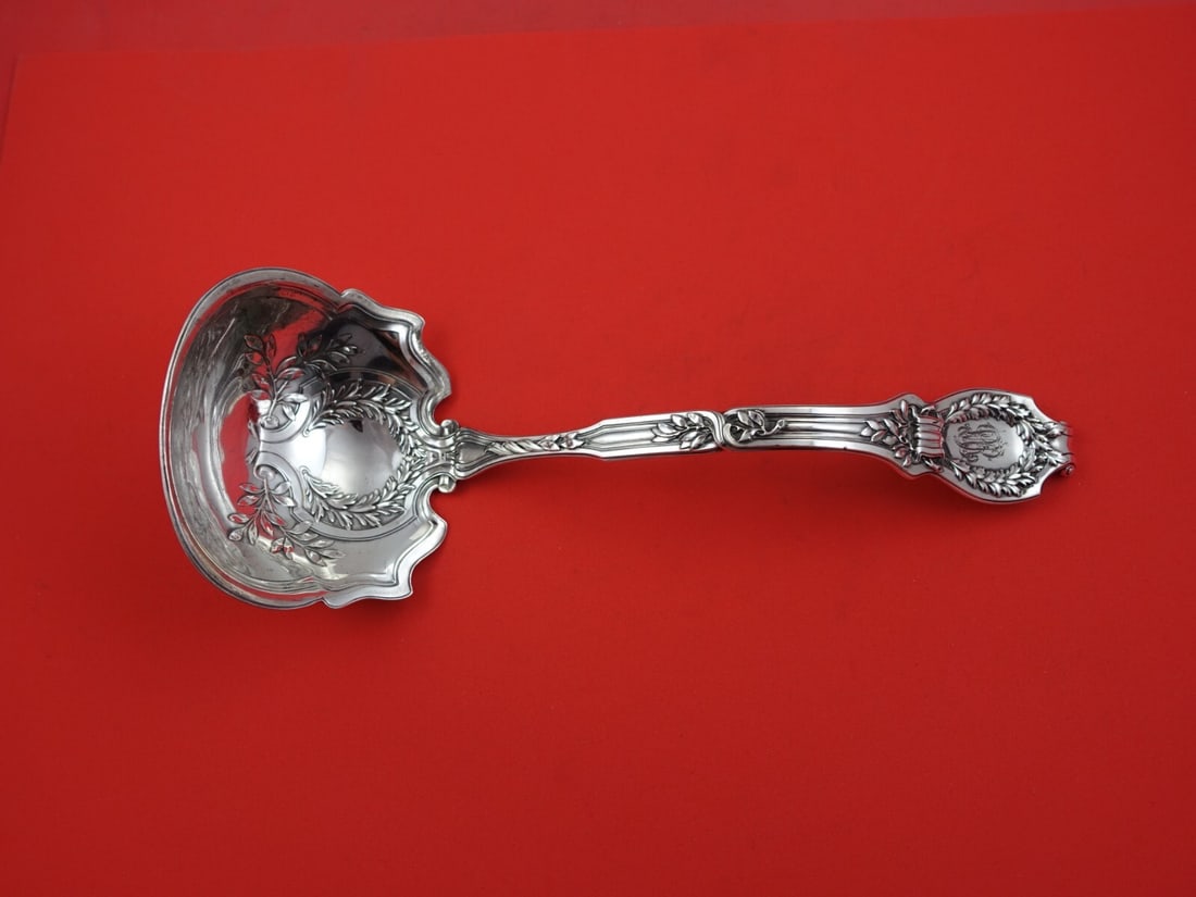 Durgin Du Barry Sterling Silver Oyster Ladle 10 3/4 Inch Monogrammed: Durgin Du Barry Sterling Silver Oyster Ladle 10 3/4 Inch Monogrammed This exquisite oyster ladle, crafted by Durgin in the elegant Du Barry pattern, showcases the timeless beauty of sterling silver. M