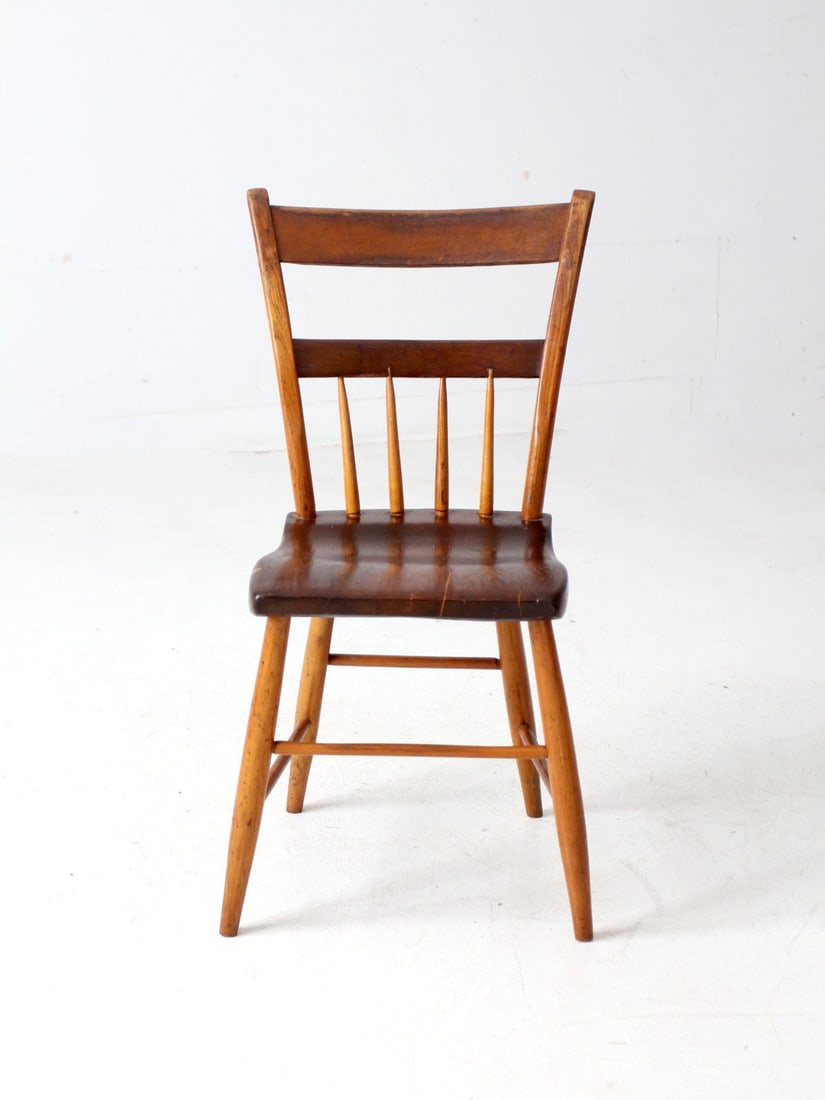 Antique Primitive Farmhouse Chair with Half Spindle Back: Antique Primitive Farmhouse Chair with Half Spindle Back This antique primitive farmhouse chair boasts a charming half spindle back and a sturdy plank seat, making it a stylish yet functional addition