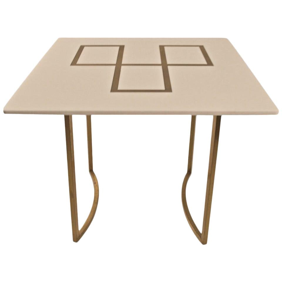1960s Squared Brass Table with White Glass Top: 1960s Squared Brass Table with White Glass Top This elegant squared table features a thick white glass top with an intricately engraved gold geometric design, supported by sturdy square brass legs. Li