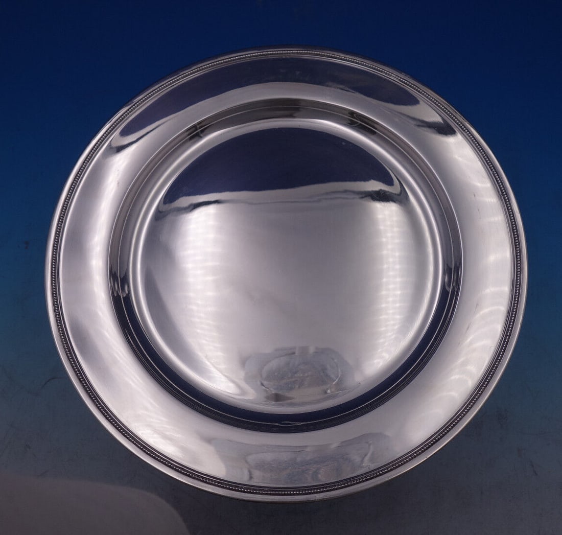 Cohr Perles 826 Silver Beaded Edge Charger Plate 11 1/4 Inch circa 1940: Cohr Perles 826 Silver Beaded Edge Charger Plate 11 1/4 Inch circa 1940 This Perles by Cohr charger plate is crafted from 826 silver and features a classic beaded border. Made in Denmark circa 1940, t