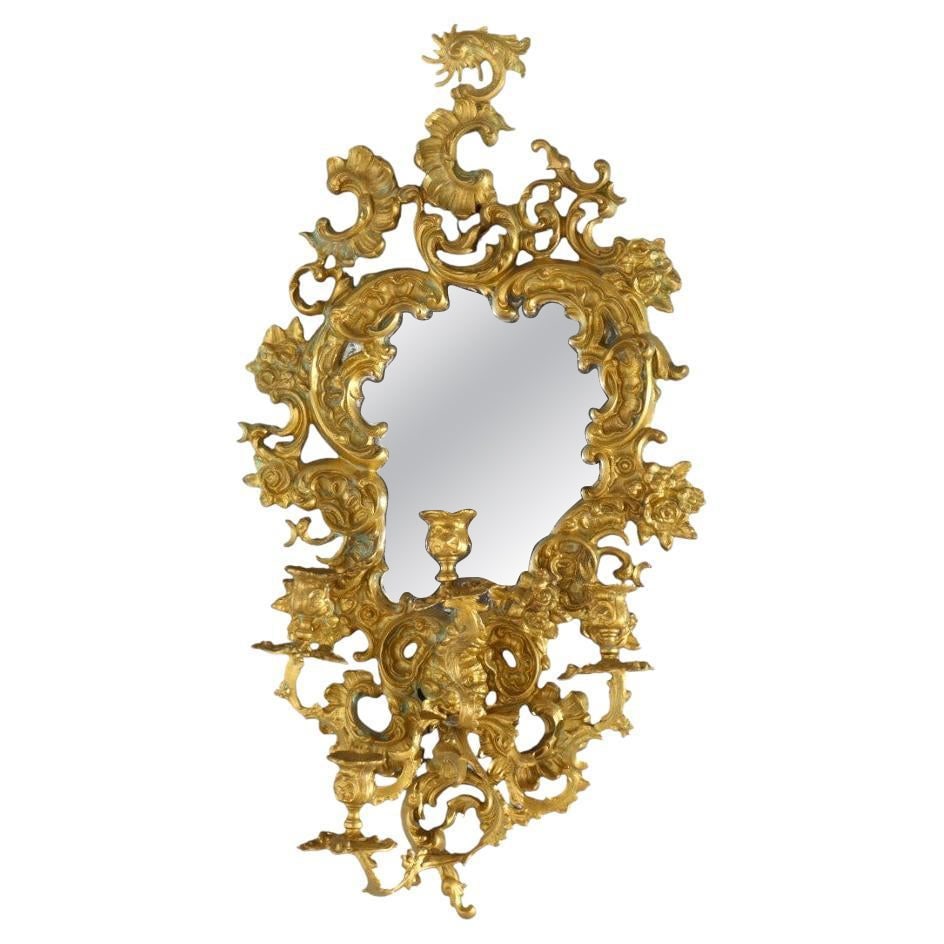Antique Louis XIV Gilt Bronze Mirror Wall Sconce c1890: Antique Louis XIV Gilt Bronze Mirror Wall Sconce c1890 Illuminate your space with this exquisite Antique French Louis XIV Gilt Bronze Mirrored Candle Wall Sconce, dating back to circa 1890. This stunn