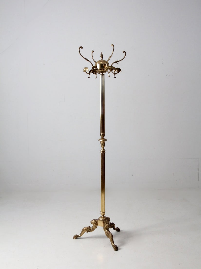 Hollywood Regency Vintage Italian Brass Coat Rack with 4 Hooks: Hollywood Regency Vintage Italian Brass Coat Rack with 4 Hooks This Vintage Italian Brass Coat Rack is a stunning piece that embodies the elegance of Hollywood Regency style. It features four double h