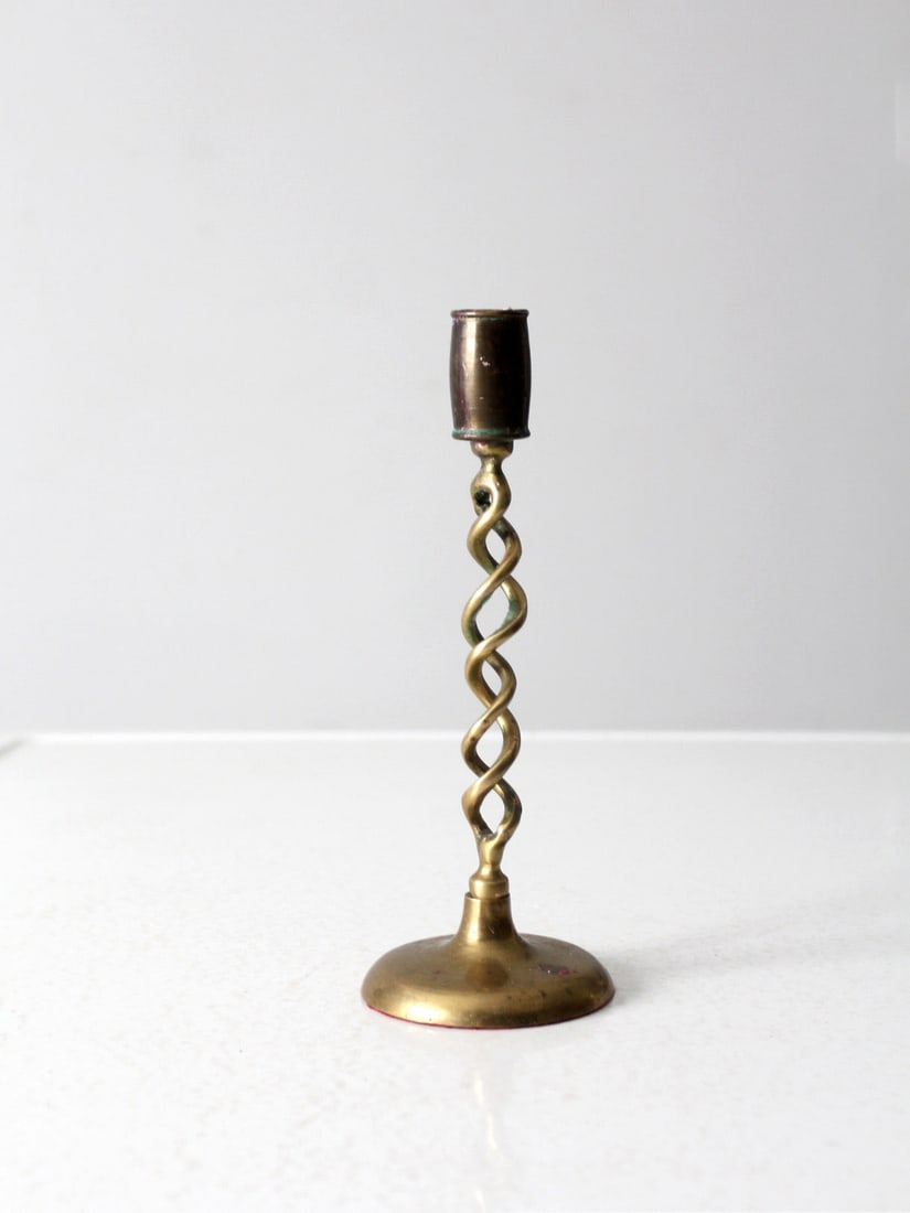 Vintage 9 Inch Brass Barley Twist Spiral Candlestick Holder: Vintage 9 Inch Brass Barley Twist Spiral Candlestick Holder This exquisite early 20th century antique brass candlestick holder features a stunning barley twist spiral design that adds a touch of vinta