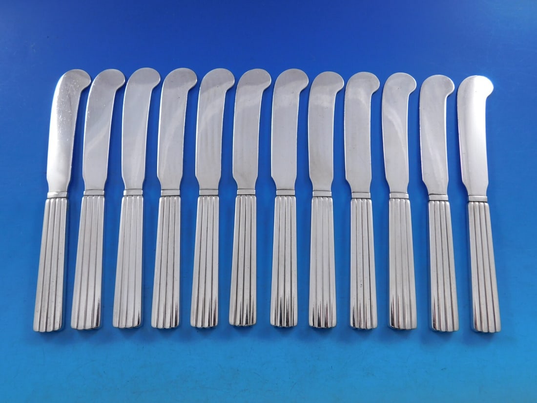 Georg Jensen Bernadotte Sterling Silver Butter Spreader Set of 12 6 Inch: Georg Jensen Bernadotte Sterling Silver Butter Spreader Set of 12 6 Inch Enhance your dining experience with this exquisite set of 12 butter spreaders from the Bernadotte pattern by Georg Jensen. Each