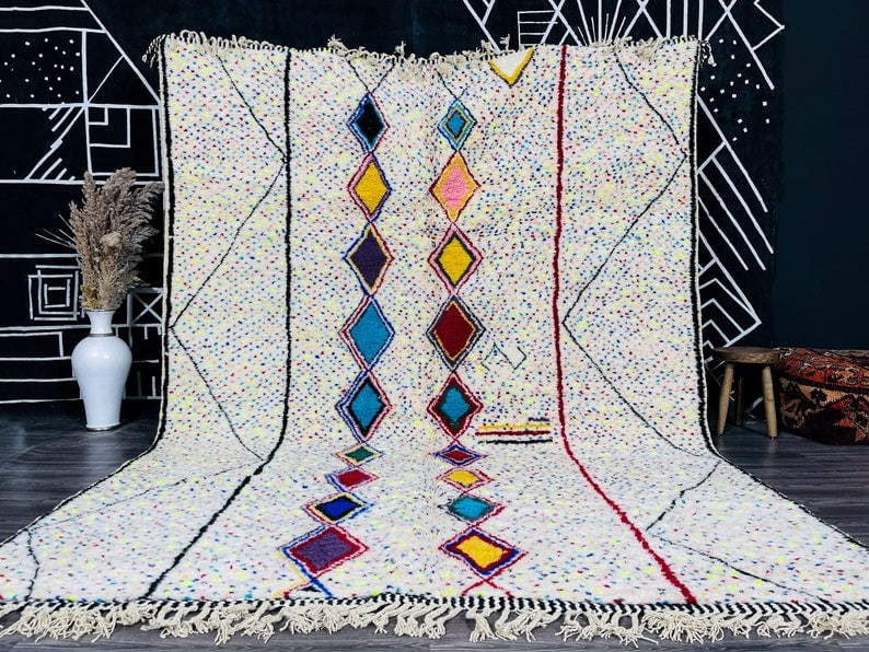 Authentic Handwoven Colorful Soft Rug from Morocco 10 x 6.56 Feet: Authentic Handwoven Colorful Soft Rug from Morocco 10 x 6.56 Feet This authentic colorful soft rug is handwoven in the Atlas Mountains by local Berber women weavers. Crafted using traditional techniqu