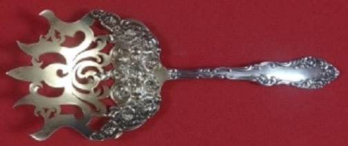 Towle Old English Sterling Silver Croquette Server Goldwashed 6 3/4": Towle Old English Sterling Silver Croquette Server Goldwashed 6 3/4" This exquisite croquette server is crafted from sterling silver and features a stunning goldwash finish. Measuring 6 3/4 inches in