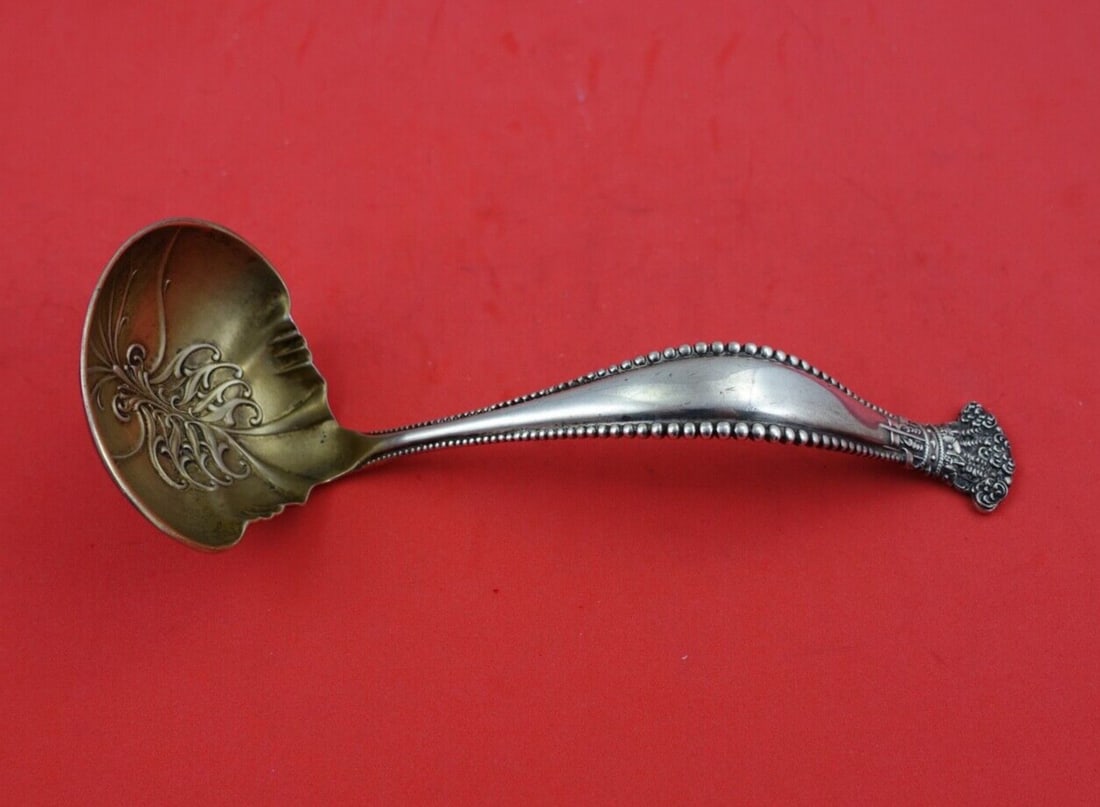 Shiebler Sandringham Sterling Silver Gravy Ladle 7 Gold Washed: Shiebler Sandringham Sterling Silver Gravy Ladle 7 Gold Washed This exquisite gravy ladle is crafted from sterling silver and features the elegant Sandringham pattern by Shiebler. Measuring 7 inches i